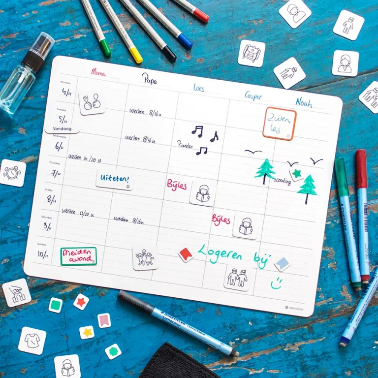 sticky whiteboard familieplanner met pictogrammen van verschillende activiteiten